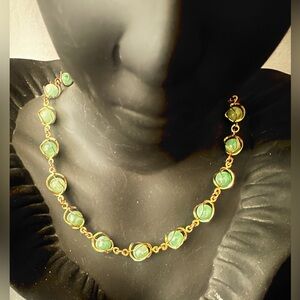Vintage Gold-Tone Necklace with Green Cabochon Accents